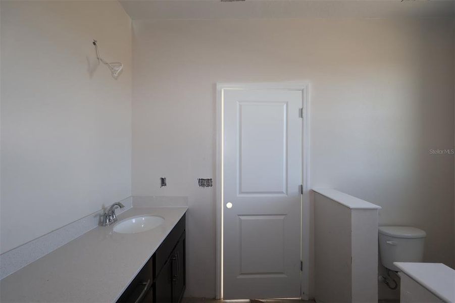 Furnished interior view inside a new home in Center Lake on the Park, St. Cloud (Image 5).