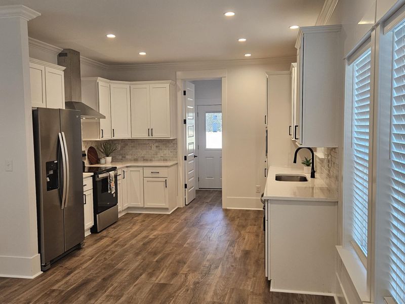 Furnished interior view inside a new home in , North Charleston (Image 3).