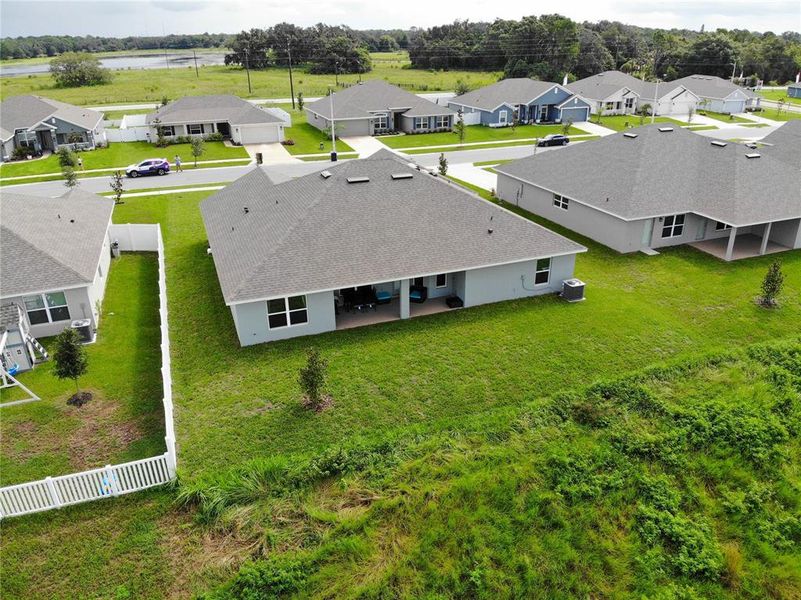 Front exterior of a new home in Cadence Crossing, Auburndale, FL, highlighting curb appeal (Image 19).