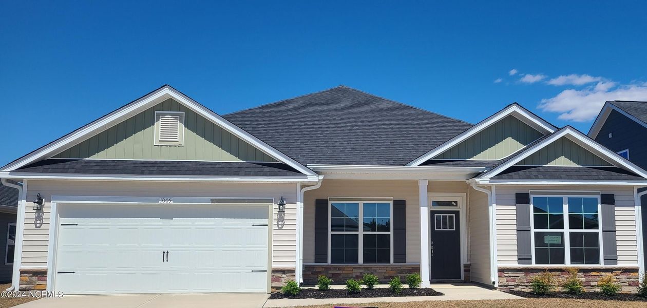 Front exterior of a new home in Athens Acres, New Bern, NC, highlighting curb appeal (Image 1).