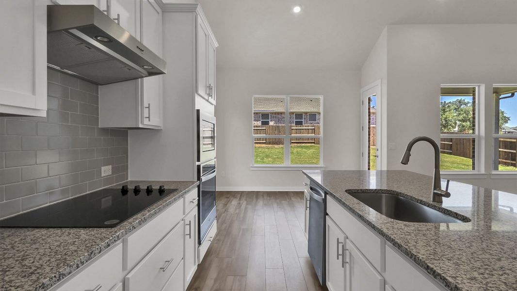 Furnished interior view inside a new home in Rosenbusch Ranch, Leander (Image 6).
