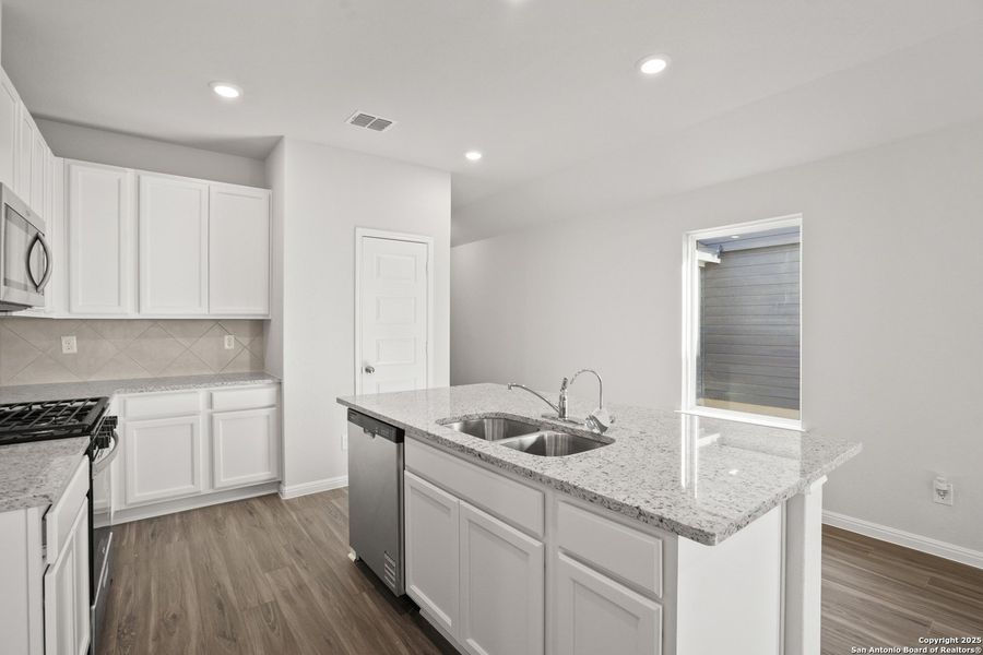 Furnished interior view inside a new home in Timber Creek, San Antonio (Image 9).