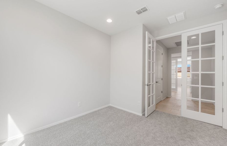 Spacious, unfurnished interior of a new home in Sun City Festival, Buckeye (Image 22).