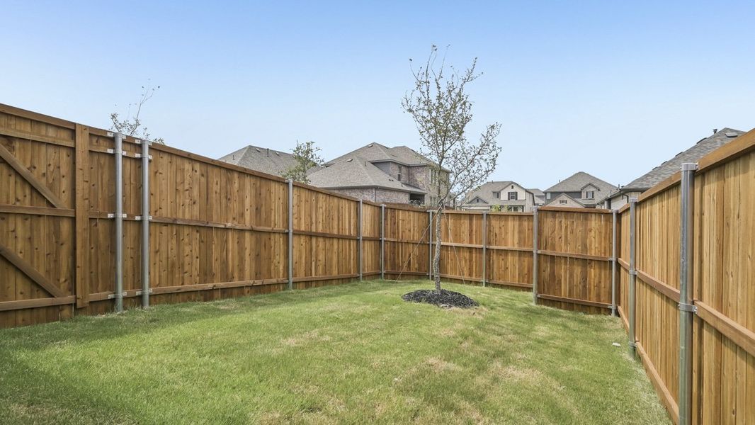 Exterior details and patio area of a home in Lilybrooke at Legacy Hills, Celina (Image 3).