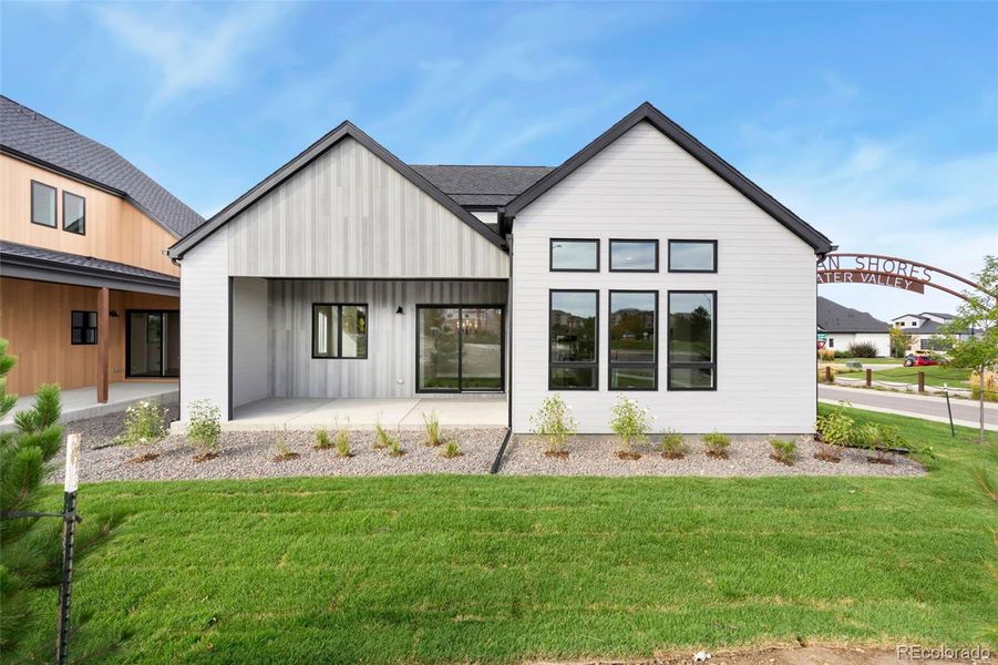 Exterior details and patio area of a home in Pelican Shores at Water Valley, Windsor (Image 4). Exterior details and patio area of a home in Pelican Shores at Water Valley, Windsor (Image 4).