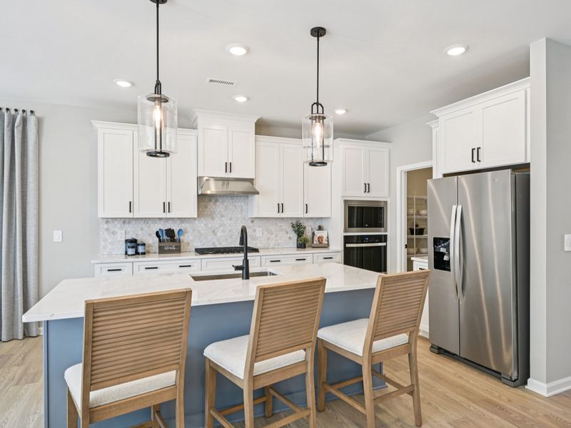 Kitchen in the Johnson floorplan at a Meritage Homes community in Raleigh, NC.