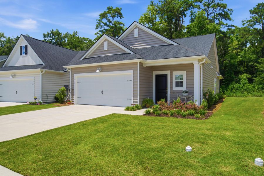 Front exterior of a new home in Horizons at Summers Corner | 55+, Summerville, SC, highlighting curb appeal (Image 23).