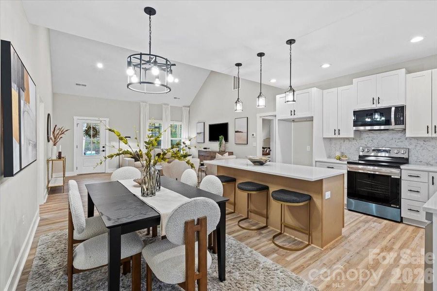 Photo of nearly identical home so you can see the space with furniture.