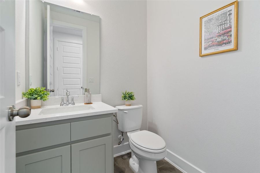 A convenient ground level half bathroom, perfect for guests!