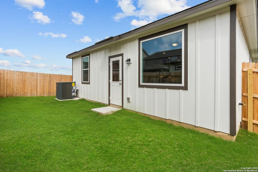 Front exterior of a new home in Highland Ridge, New Braunfels, TX, highlighting curb appeal (Image 2). Front exterior of a new home in Highland Ridge, New Braunfels, TX, highlighting curb appeal (Image 2).