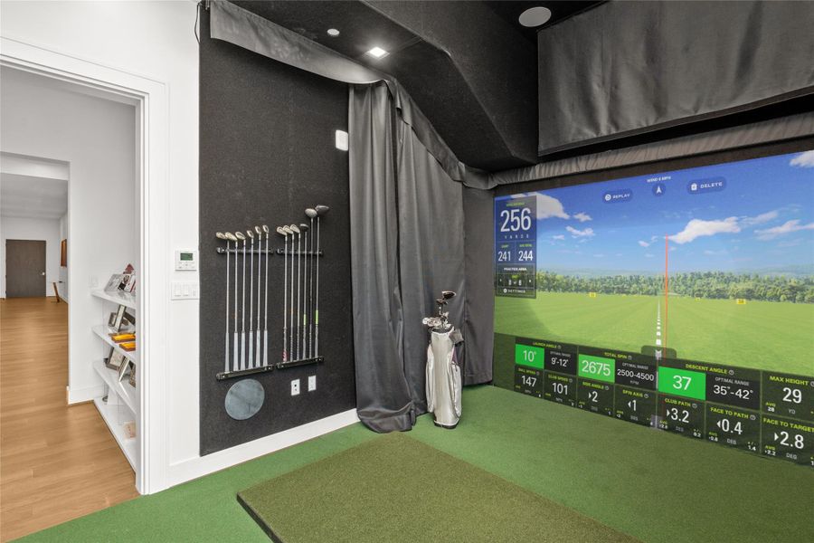 Golf simulated room or third ensuite bedroom.