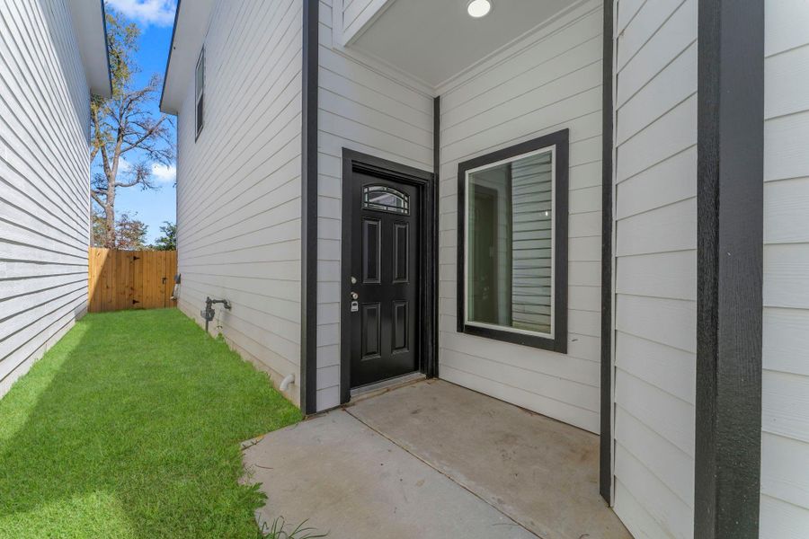 Exterior details and patio area of a home in , Houston (Image 3).