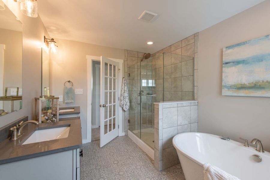 Representative furnished interior of a home built from the Addison by Keystone Custom Homes in Mayes Hall, Davidson (Image 8).