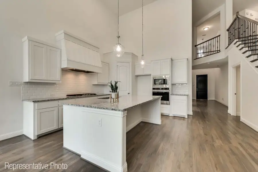 Representative furnished interior of a home built from the Charleston II by Grand Homes in Grand Oaks, Celina (Image 7).