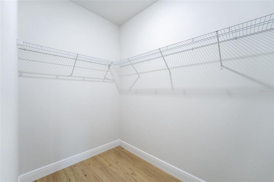 The pictures are from a different house but feature the same floor plan and finishes.