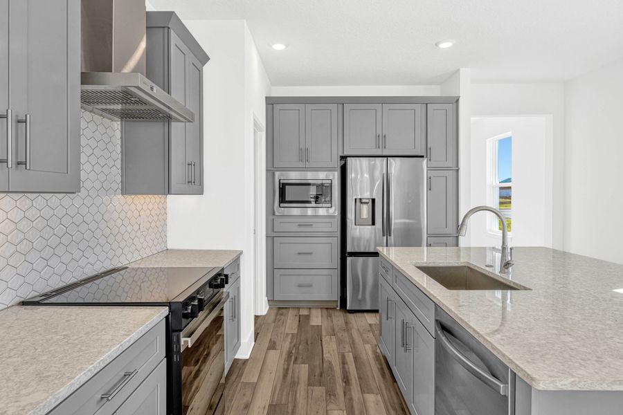 Representative furnished interior of a home built from the Whitney by Rockwell Homes in Harvest at Ovation - Townhomes, Winter Garden (Image 7). Representative furnished interior of a home built from the Whitney by Rockwell Homes in Harvest at Ovation - Townhomes, Winter Garden (Image 7).