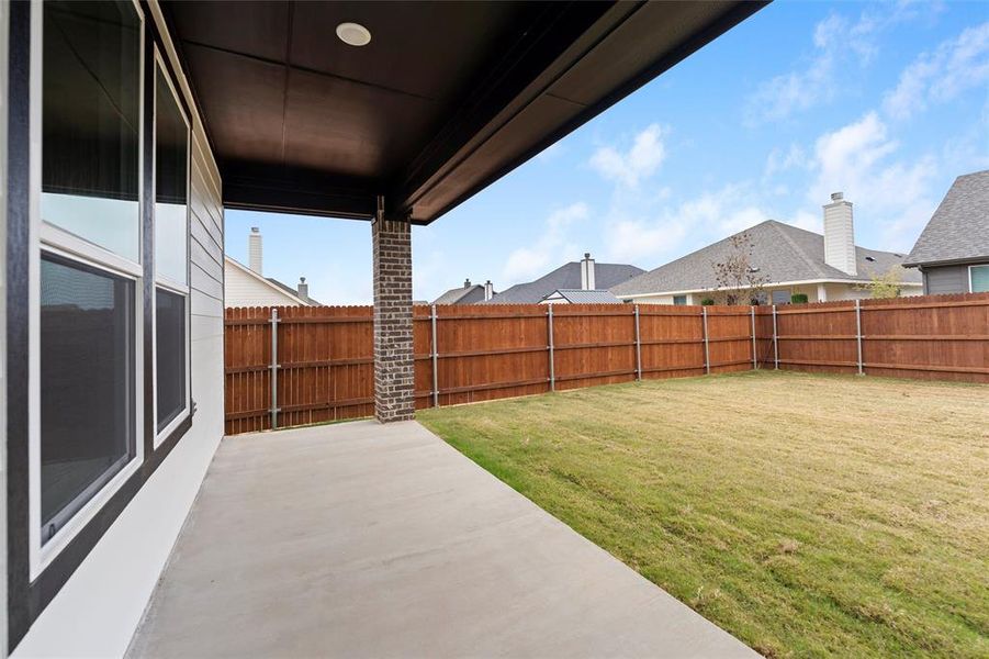 Exterior details and patio area of a home in Covenant Park, Springtown (Image 26).