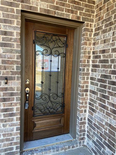 Great first impression with iron & glass front door