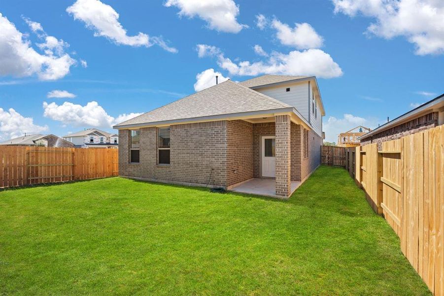 This backyard is perfect for family gatherings, social events, or simply unwinding in the fresh air.