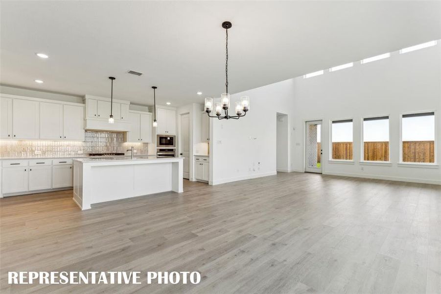 Featuring an open and flowing floor plan, this dream home is an entertainers delight!  REPRESENTATIVE PHOTO