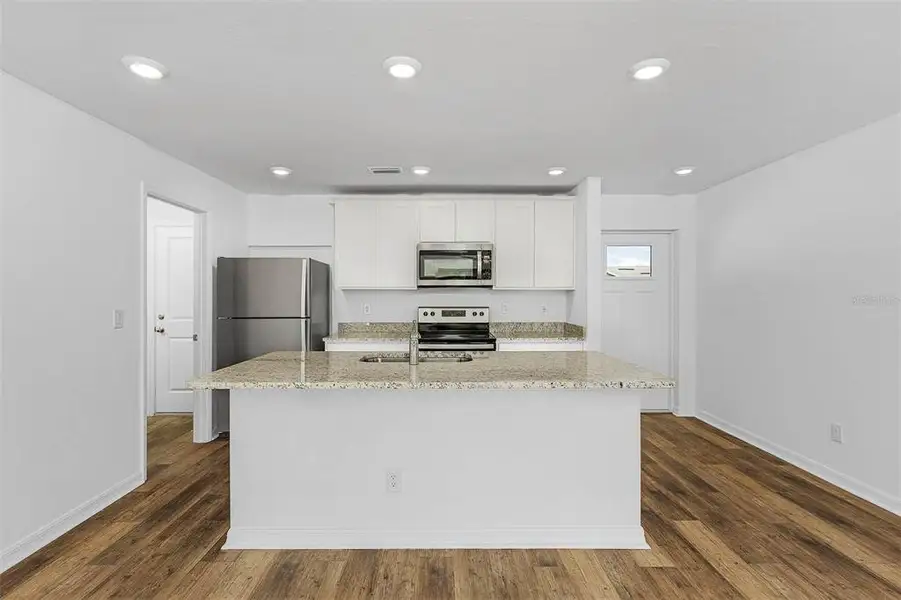 Furnished interior view inside a new home in , Port Charlotte (Image 4).