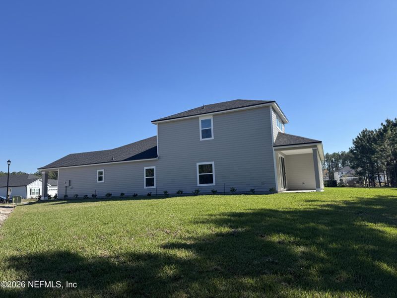 Exterior details and patio area of a home in Hyland Trail, Green Cove Springs (Image 3).