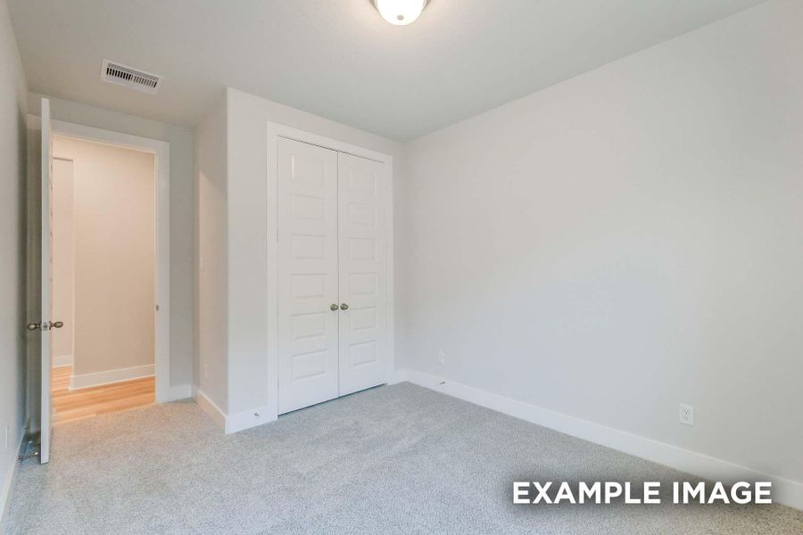 Spacious, unfurnished interior of a new home in Sunterra, Katy (Image 21).