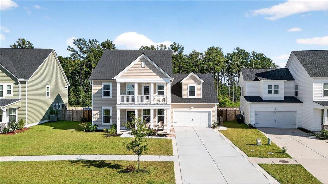 Front exterior of a new home in , Summerville, SC, highlighting curb appeal (Image 27).