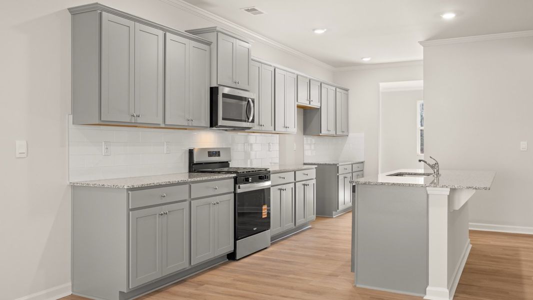 Representative furnished interior of a home built from the Halton by D.R. Horton in South Wind, South Fulton (Image 7).