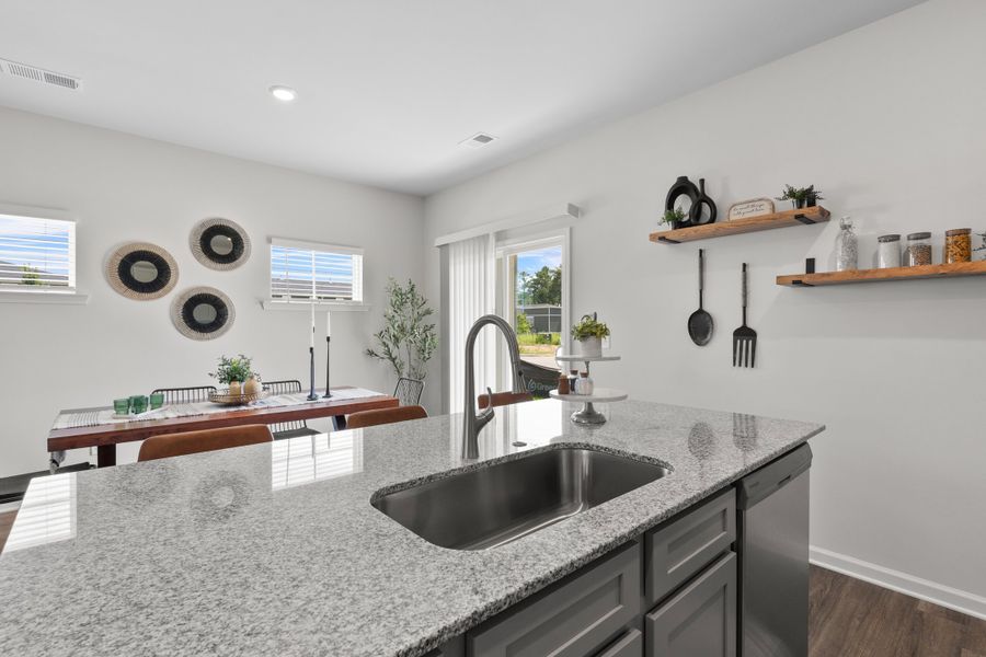 Representative furnished interior of a home built from the Palmetto II by McGuinn Homes in Clarke Townes, Anderson (Image 36).