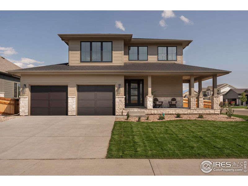 Front exterior of a new home in Greenspire At Windsor Lake, Windsor, CO, highlighting curb appeal (Image 20).