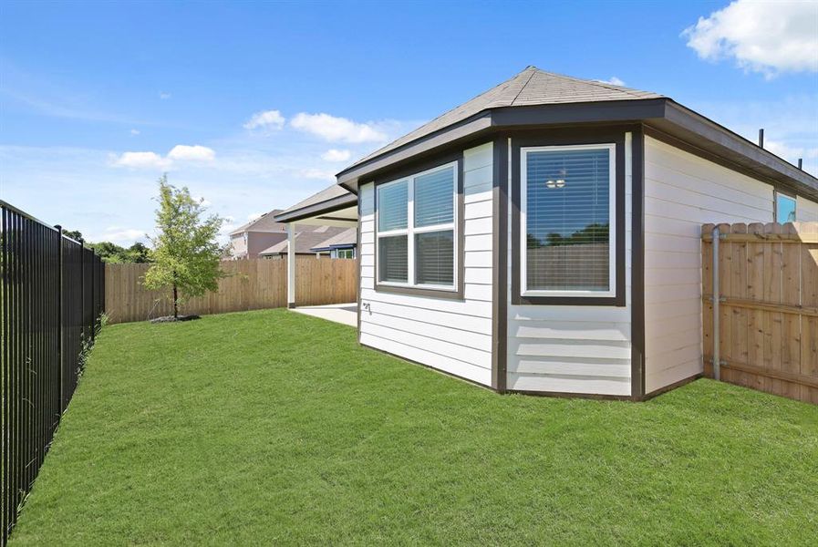 Front exterior of a new home in Deer Creek, Fort Worth, TX, highlighting curb appeal (Image 2).