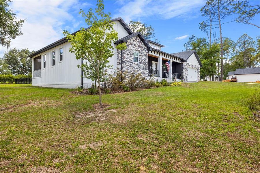 Exterior details and patio area of a home in , Dade City (Image 27).