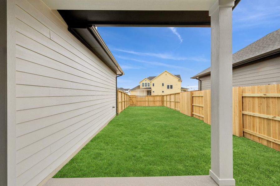Exterior details and patio area of a home in Elyson 40', Katy (Image 4).