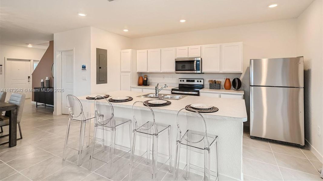 Furnished interior view inside a new home in Palm Cay, Florida City (Image 13).