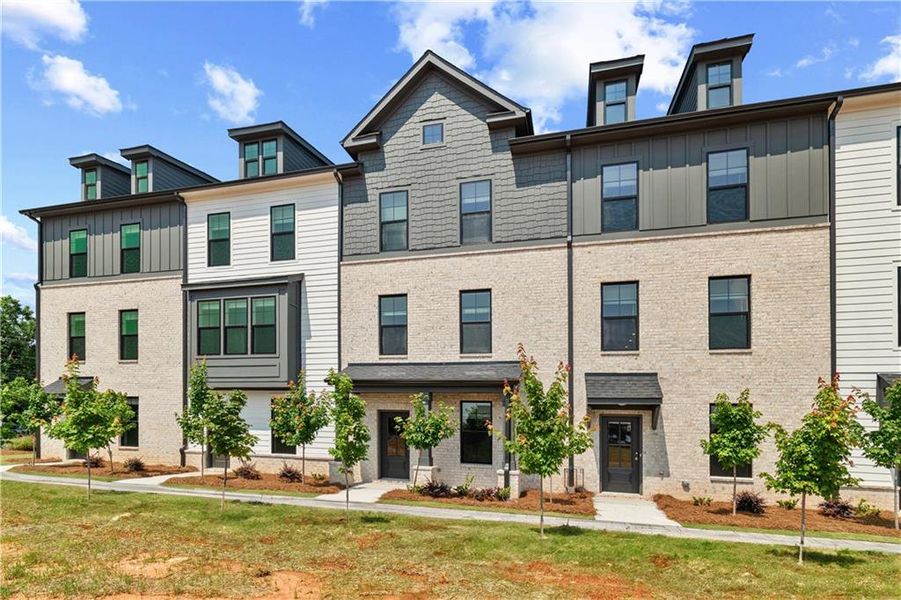 Front exterior of a new home in Silverock, McDonough, GA, highlighting curb appeal (Image 20). Front exterior of a new home in Silverock, McDonough, GA, highlighting curb appeal (Image 20).