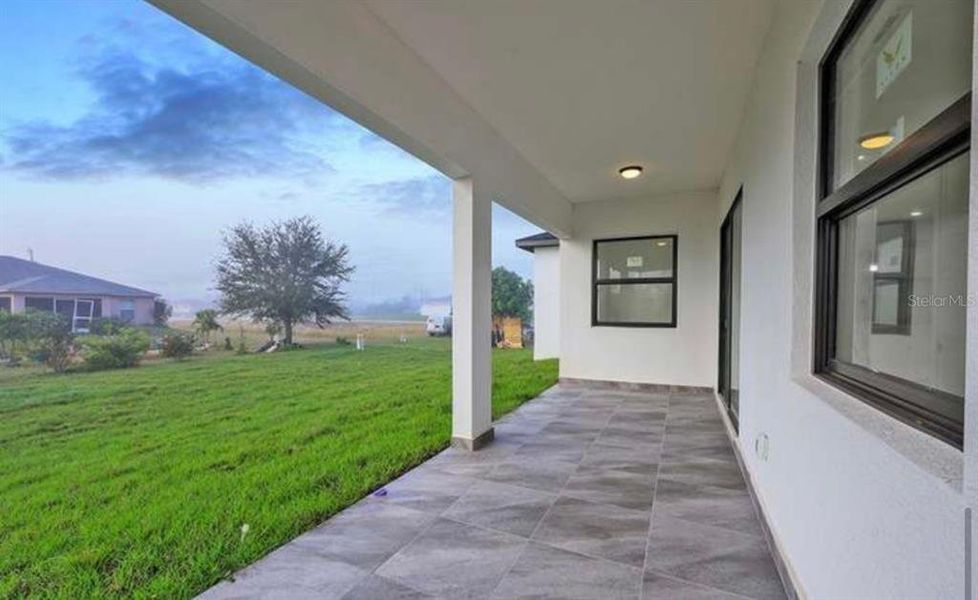 Exterior details and patio area of a home in , Lehigh Acres (Image 2). Exterior details and patio area of a home in , Lehigh Acres (Image 2).
