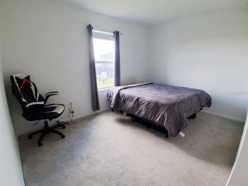 Furnished interior view inside a new home in Hunt Club Groves, Lake Wales (Image 50).