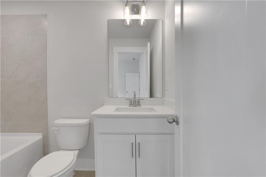 Furnished interior view inside a new home in The Paddocks at Doc Hughes, Buford (Image 10).