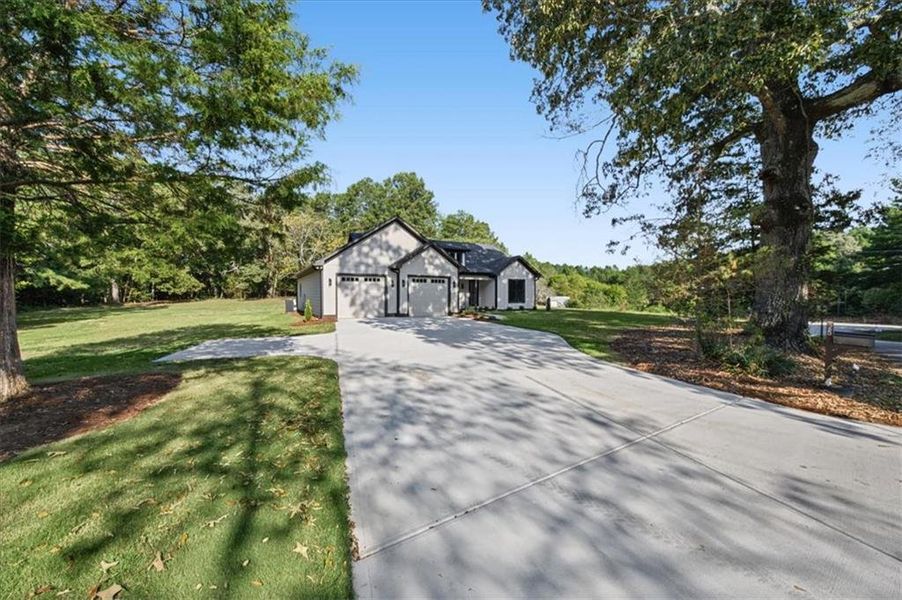 Front exterior of a new home in , Taylorsville, GA, highlighting curb appeal (Image 23).