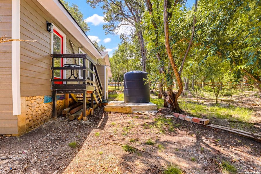 Exterior details and patio area of a home in , Lakehills (Image 20).