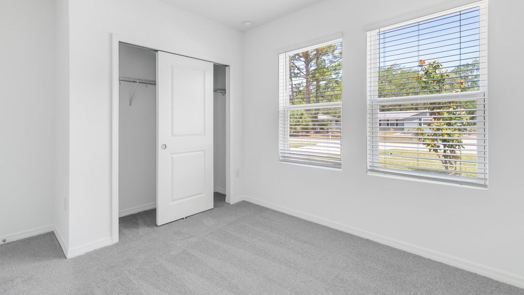 Representative unfurnished interior of a home built from the Ambrosia by Taylor Morrison in Aden South at Westview, Kissimmee (Image 22).