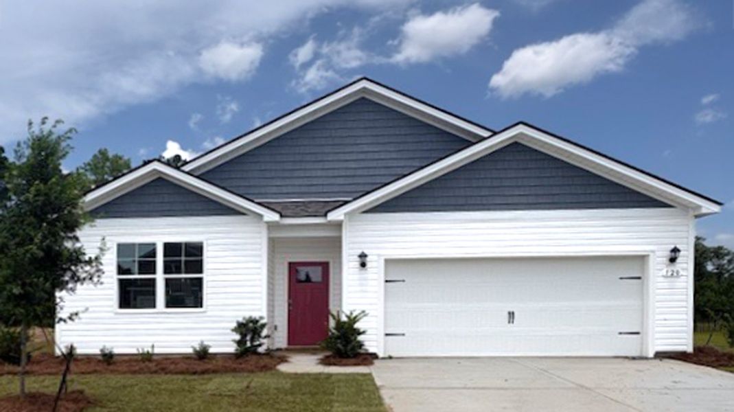 Front exterior of a new home in Pinewood Estates, Conway, SC, highlighting curb appeal (Image 1). Front exterior of a new home in Pinewood Estates, Conway, SC, highlighting curb appeal (Image 1).