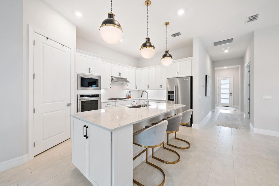 Furnished interior view inside a new home in Avondale at Avenir, Palm Beach Gardens (Image 9).