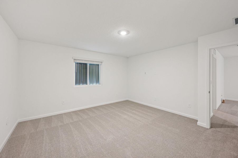 Spacious, unfurnished interior of a new home in Meritage Homes at Terra Lago - Premier Series, Indiantown (Image 17).