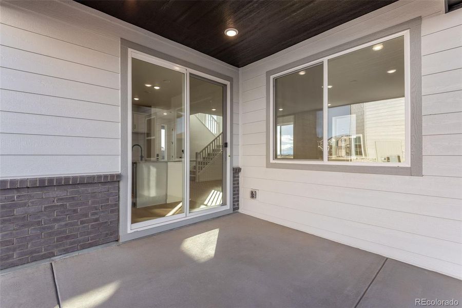 Exterior details and patio area of a home in Painted Prairie, Aurora (Image 33). Exterior details and patio area of a home in Painted Prairie, Aurora (Image 33).