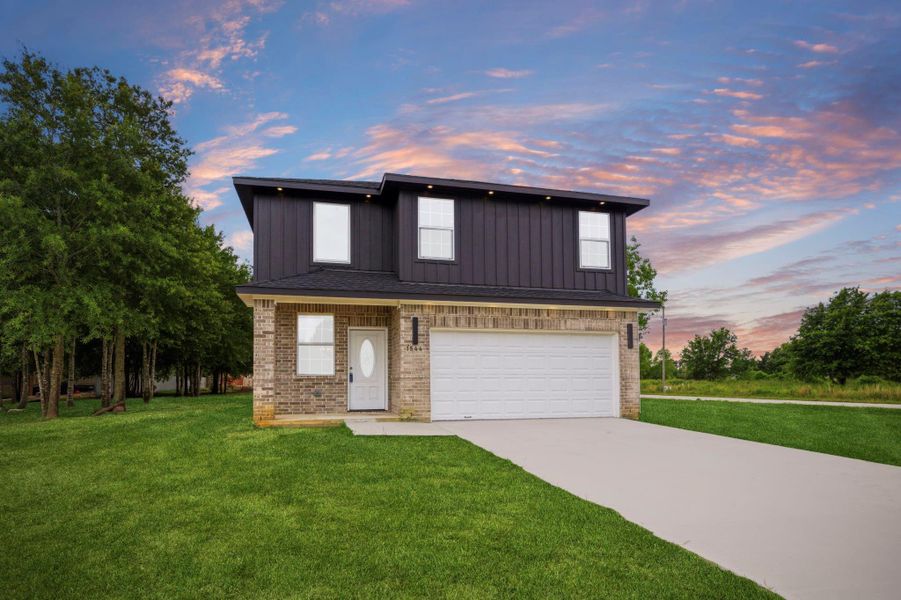 Front exterior of a new home in , Cleveland, TX, highlighting curb appeal (Image 35). Front exterior of a new home in , Cleveland, TX, highlighting curb appeal (Image 35).