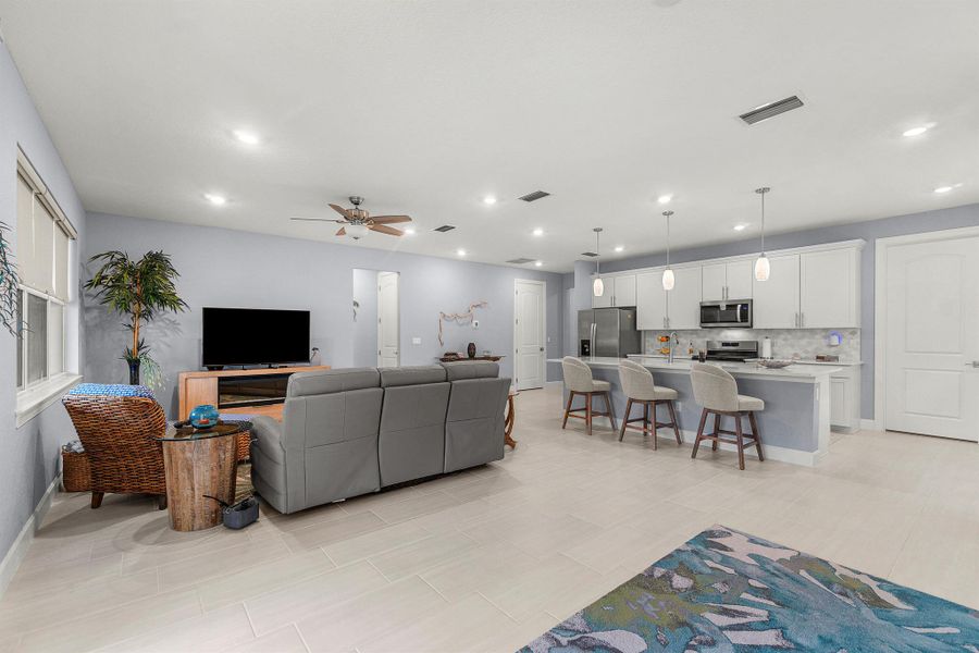 Furnished interior view inside a new home in , Port St. Lucie (Image 26).