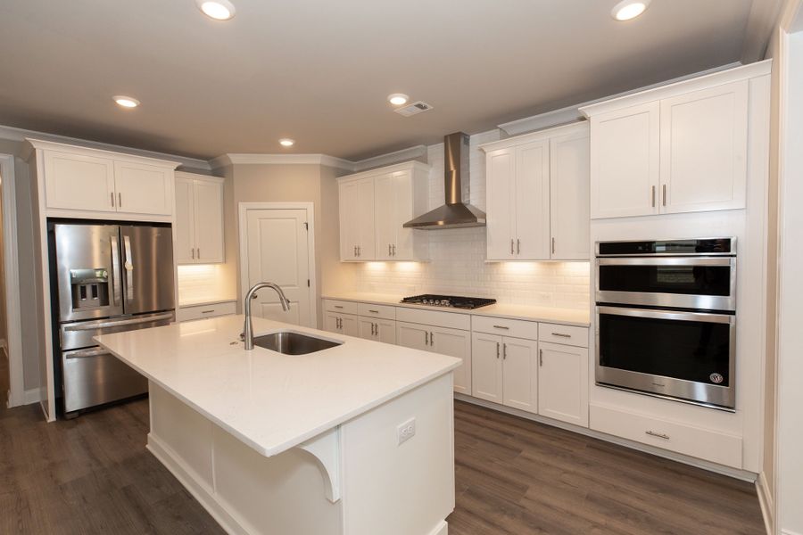 Representative furnished interior of a home built from the The Charleston by The Providence Group in Aberdeen, Hoschton (Image 7).