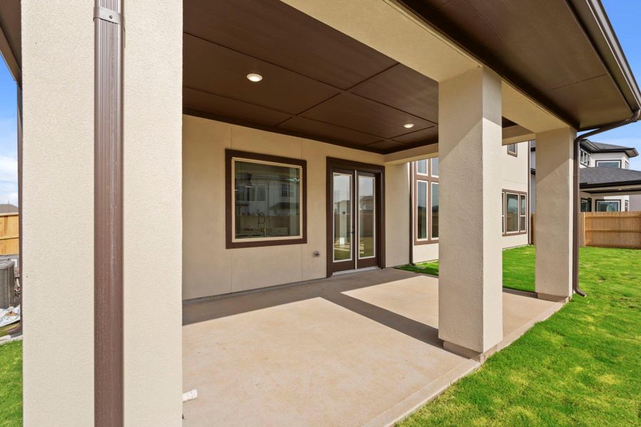Exterior details and patio area of a home in Elyson 45' & 70', Katy (Image 4).